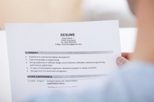 Person Holding Resume